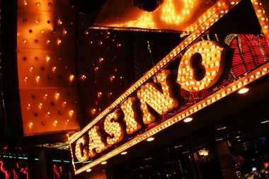 janjiqq platform interface showing sports betting, live-dealer tables, and slot games